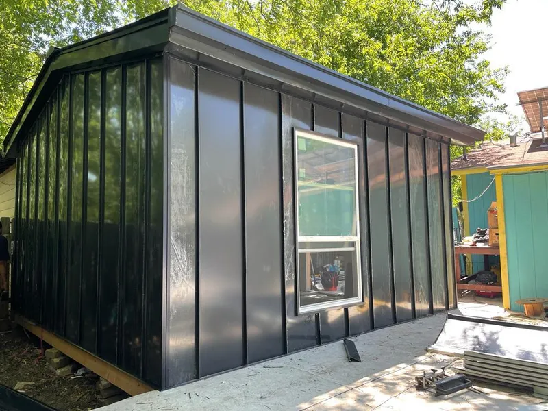 Black standing seam metal wall panels for Metal Roof Installation in Sartell