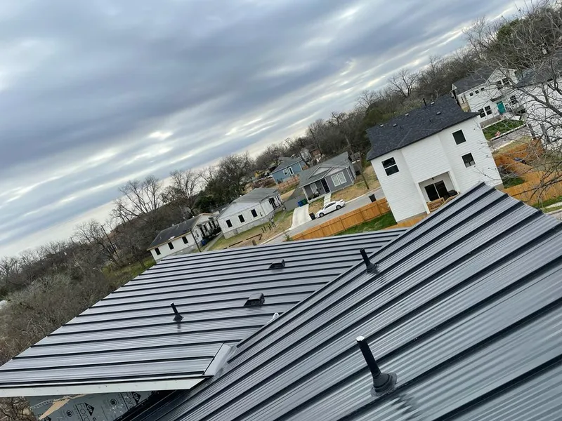 Standing seam metal roof panels with vents for Skylight Repair in Sartell